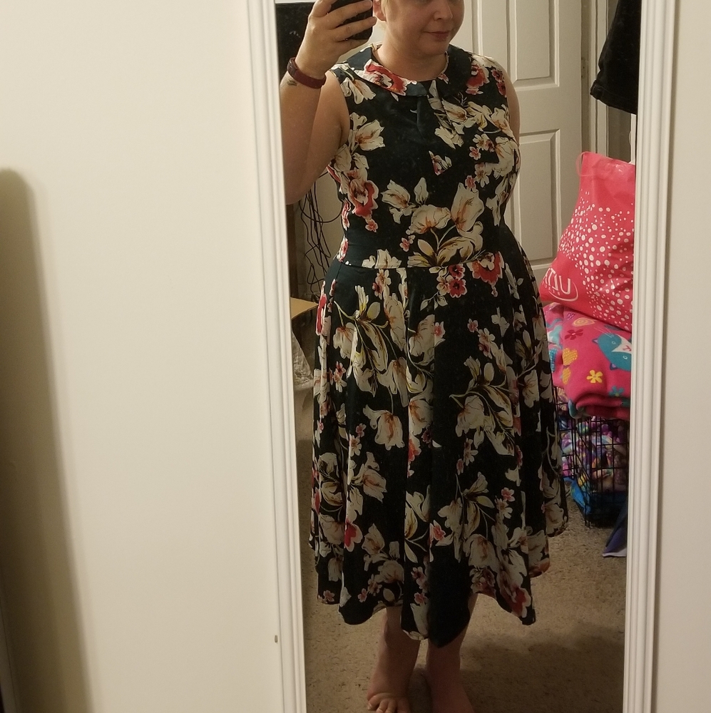 Unique Vintage sleeveless, high-necked floral dress with pockets